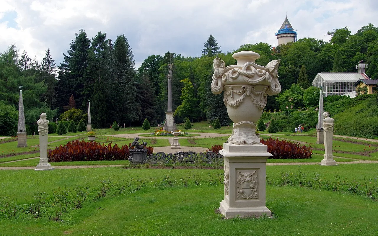 Stone urns and obelisks along the garden walk